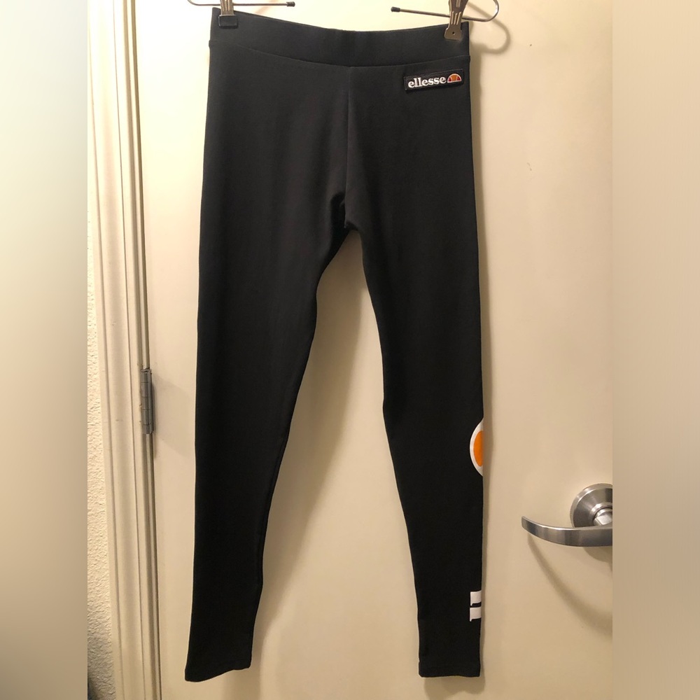 Ellesse Trivalle Black Leggings with Orange Logo Accent